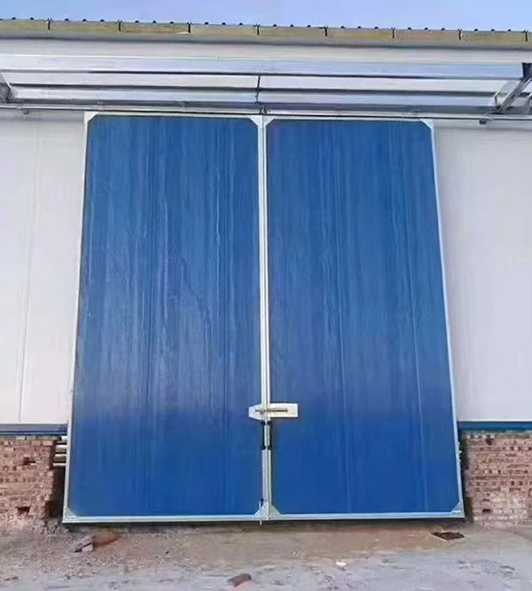 张家川工业门在大型仓储物流通道中的应用实例